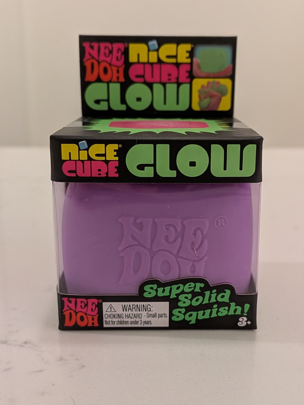 NeeDoh Nice Cube Glow Purple Super Solid Squish Toy
